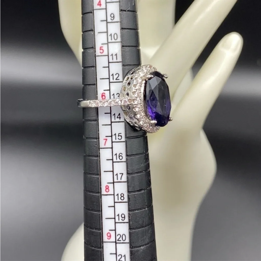 Sterling Silver amethyst prong set cocktail ring with gemstone halo bezel